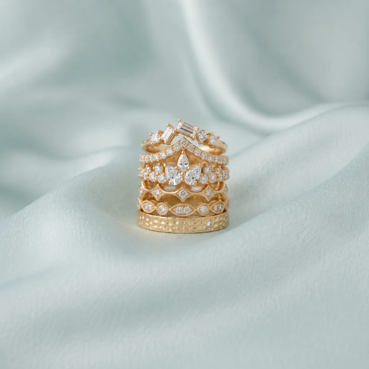 RAUSCHMAYER diamond-set wedding bands in gold