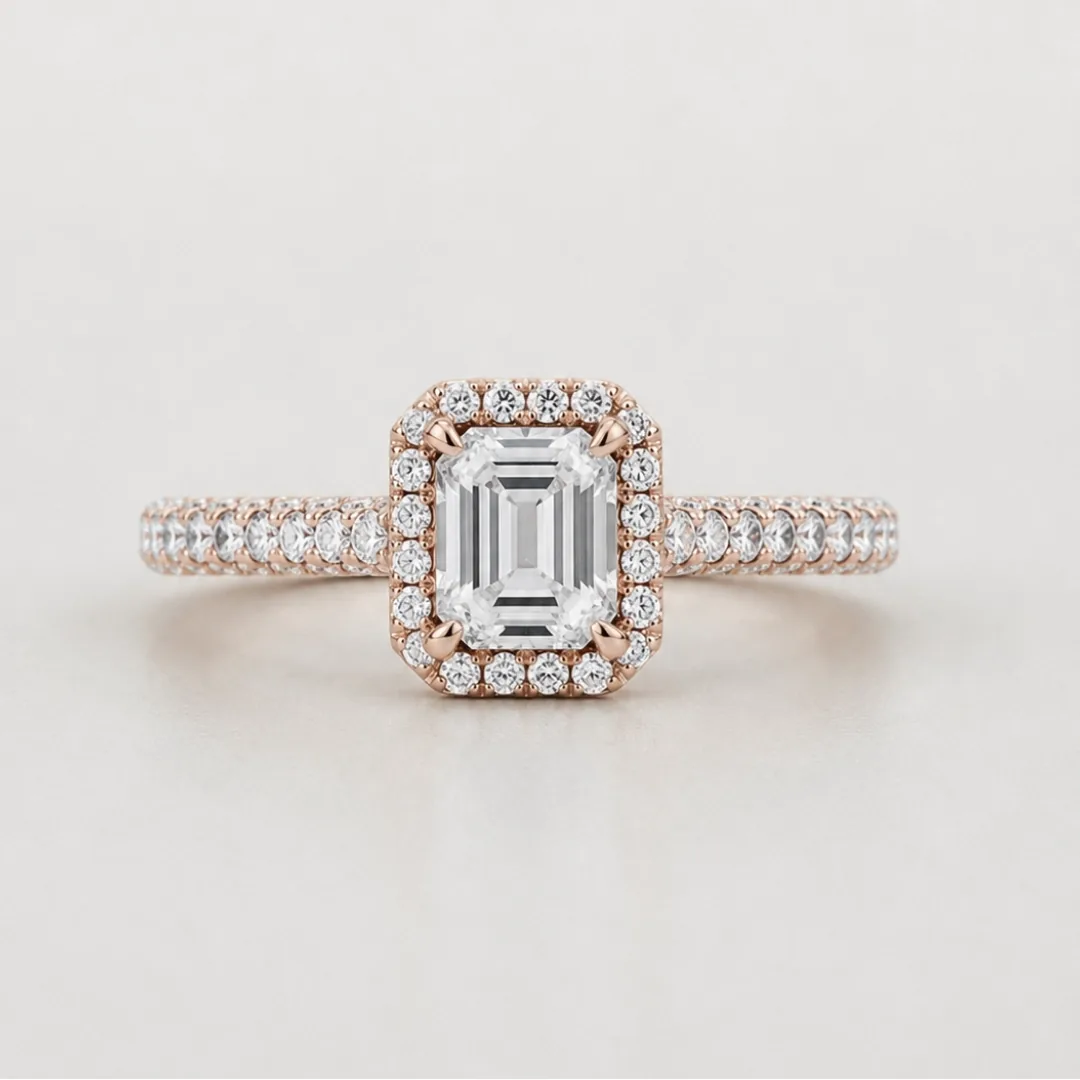 An emerald-cut halo ring made to order from a customer's own design