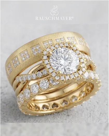The complete RAUSCHMAYER bridal set — engagement ring, wedding band and eternity band in gold